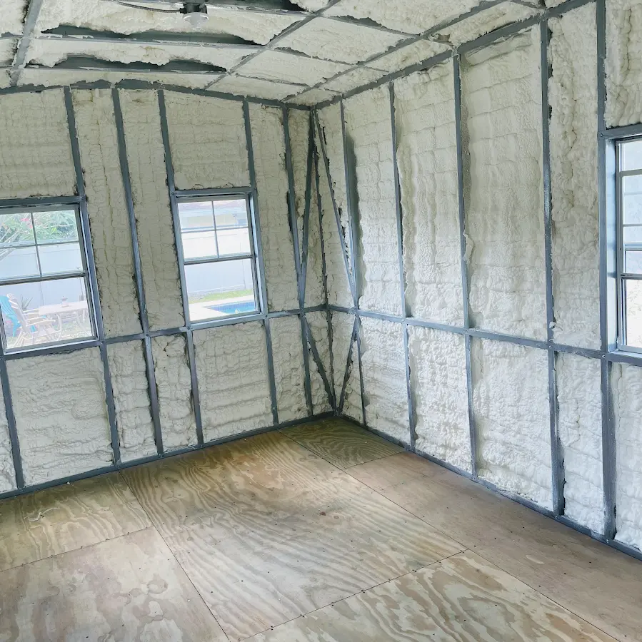 Closed-cell spray foam insulation applied to wall cavities in a residential project in McLendon-Chisholm